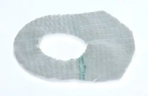 Isolierring von Bosch, ovales Objekt aus weißem Material mit mittigem Loch, Struktur wird durch feine Linien erkennbar.
